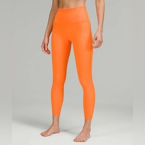 Lululemon Wunder Under High-Rise Tight 25"
Orange Soda size 4